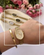 ساعت نایدو بیضی با صفحه طلایی روی دست